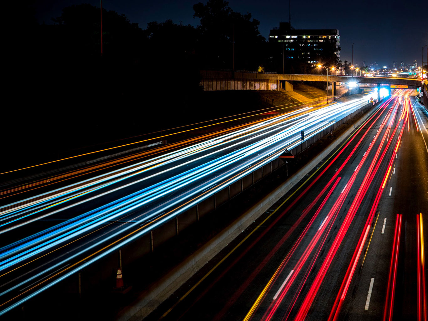 long-exposure shot of car lights on highway